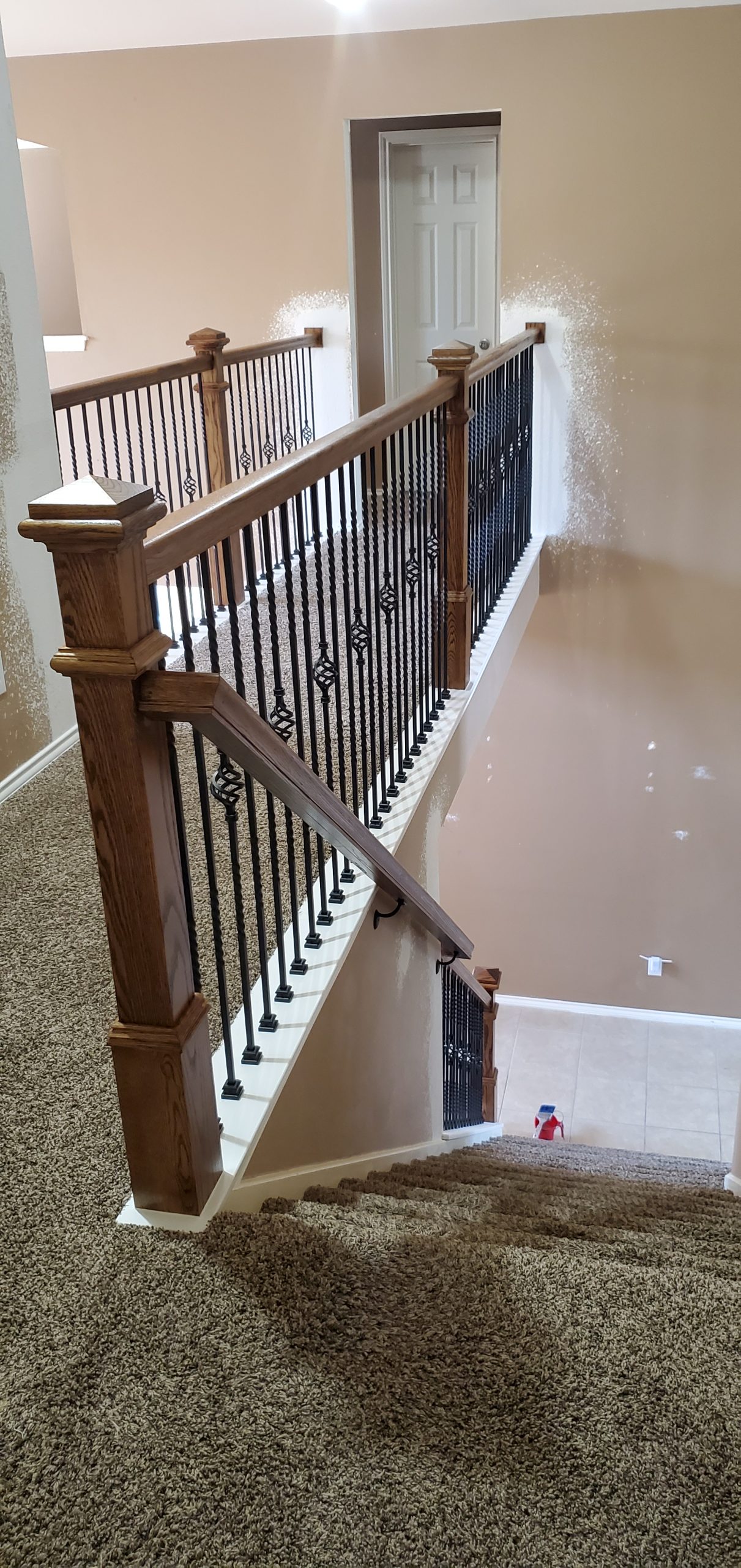 a fully installed carpet in a staircase