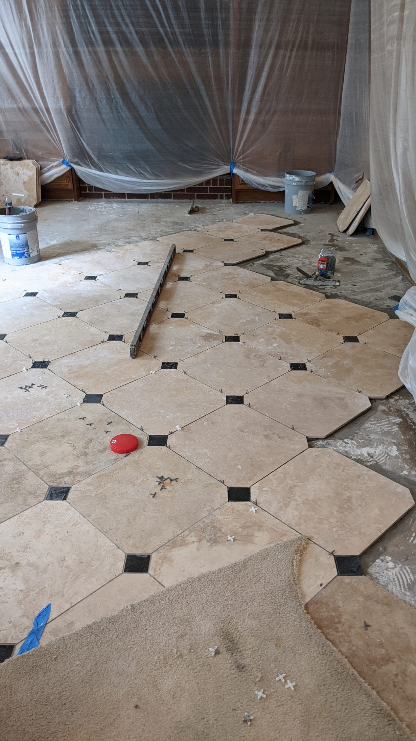 installing floor tiles